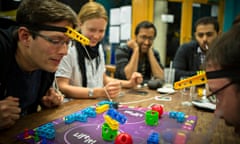 Punters at Thirsty Meeples board game cafe, Oxford, play Lift It.