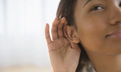 Woman cupping ear