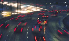 Red car lights on motorway