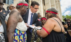 Doris Eaton presenting petition to Ben Wyatt 