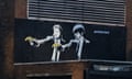 Banksy's graffito of John Travolta and Samuel  Jackson shooting with bananas instead of guns