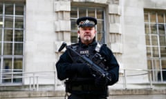 A police guard in London. Theresa May said Isis had given 'a renewed sense of purpose' to subversive