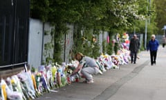 Tributes to Ann Maguire outside Corpus Christi School, Leeds, where she was murdered by a pupil.