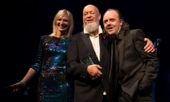 Jo Whiley, Michael Eavis and Lars Ulrich on stage at the Music Industry Trust Awards at Grosvenor House Hotel in London.