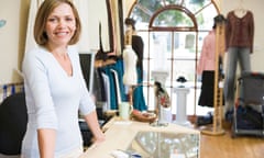 Woman at clothing store smiling