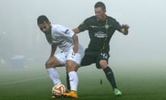 Callum McGregor vies for the ball with Joaozinho of Astra Giurgiu.