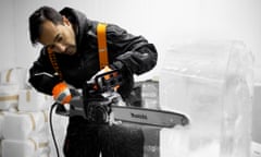 Rhik Samadder uses a chainsaw on a block of ice