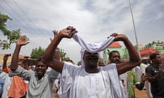 Sudanese anti-government protesters chant in the Omdurman district of Khartoum, Sudan.