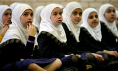 Muslim girls from Lakemba listen to a class about the acceptance of different faiths in Australia.