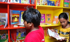 Street children reading books