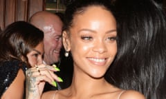 Rihanna with pointy green fingernails