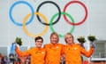 Silver medalist Jan Smeekens, gold medallist Michel Mulder and bronze medalist Ronald Mulder during the flower ceremony for the Men's 500m Speed Skating.