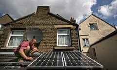 Man installing solar panels