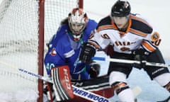 Columbus Cottonmouths goaltender Shannon Szabados defends against the Knoxville Ice Bears forward Tyler Klein