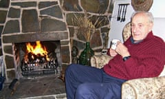 Geoff Amatt in front of his fire