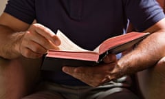Man reading a Bible