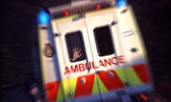 Rear view of an ambulance, blue lights flashing and hand pressed against window as it speeds off