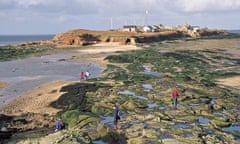 People walking between Middle Eye and Hilbre Island, Wirral