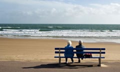 An elderly couple looking out to sea in Bournemouth