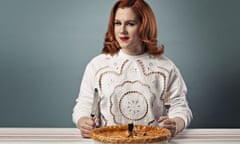 Katy B eating a pie