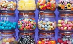 Colourful assorted childrens sweets and candy in jars