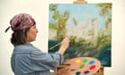 Woman painting on easel