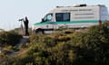 Portuguese police searching for Madeleine McCann at the Praia da Luz scrubland