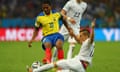 Ecuador's Antonio Valencia challenges France's Lucas Digne. Valencia was sent off for the foul.