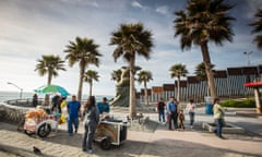 The border fence that divides Mexico from the United States runs out to sea in Tijuana.