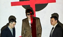 Preaching the Euro-message … Sean Moore, Nicky Wire and James Dean Bradfield with a projected artwor