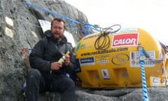 Nick Hancock on Rockall celebrates setting new occupation records on the isolated Atlantic islet with a bottle of champagne.