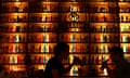 Two men drink beers in a bar in central Athens, Greece