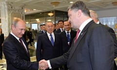 Vladimir Putin, left, with Ukraine's Petro Poroshenko in Belarus as Nursultan Nazarbayev looks on
