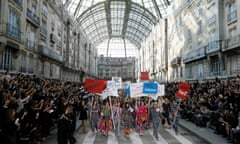 Models stage a 'feminist demonstration' at the Chanel show of Karl Lagerfeld, who once declared: 'No