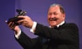 Roy Andersson poses with the Golden Lion on 6 September in Italy.