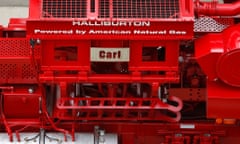 Halliburton Co. signage is displayed on the Dual-Fuel Q10 Pumping Unit (fracturing pump) outside of the company's facility in Houston, Texas, on May 9, 2013.