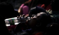 Indian woman drinking water