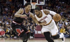 The Cleveland Cavaliers' Kyrie Irving drives past the Chicago Bulls' Derrick Rose.