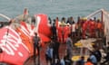 Wreckage from AirAsia flight 8501 is lifted into a ship at sea south of Borneo island on 10 January.