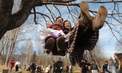 Belarusian women play on a swing at a Slavic "Spring welcome" festival in the village of Viazynka, about 40 km (25 miles) northwest of Minsk.