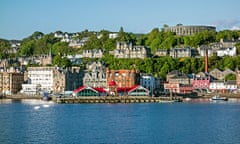 The North Pier in Oban, with McCaig's Tower above.