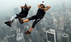 BASE jumpers take part in the annual KL Tower International Jump in Kuala Lumpur, Malaysia.