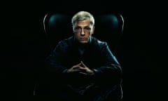 Photograph of Christoph Waltz sat in black leather chair