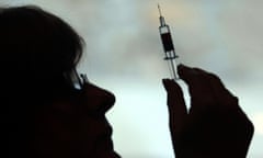 nurse shot vaccine syringe
