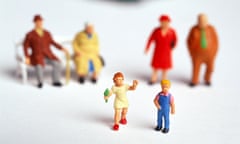 Grandparents with grandchildren and senior couple sitting on a bench (toy)