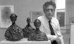 Alberto Giacometti with three of his sculptures in  1962