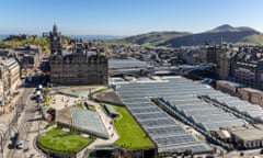 Looking East across Edinburgh to the Balmoral Hotel, Waverley Railway Station, North Bridge, Old Town and Arthur's Seat.