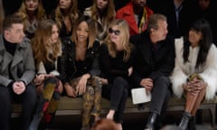 From left: Sam Smith, Cara Delevingne, Jourdan Dunn, Kate Moss, Mario Testino and Naomi Campbell at the Burberry show.