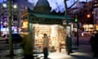 Newspaper kiosk in Paris at dusk