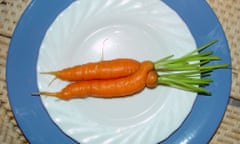 Ugly carrot on a plate